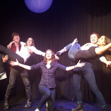 musical improv Second City onstage Brick Box Theatre
